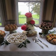 Coral peonies cake and sweet table