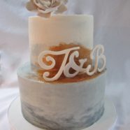 Grey white and copper wedding cake