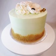 gold and mint green cake