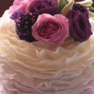 Lilac ombre ruffled cutting cake